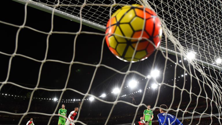Arsenal's Aaron Ramsey scores his team's third goal past Costel Pantilimon of Sunderland