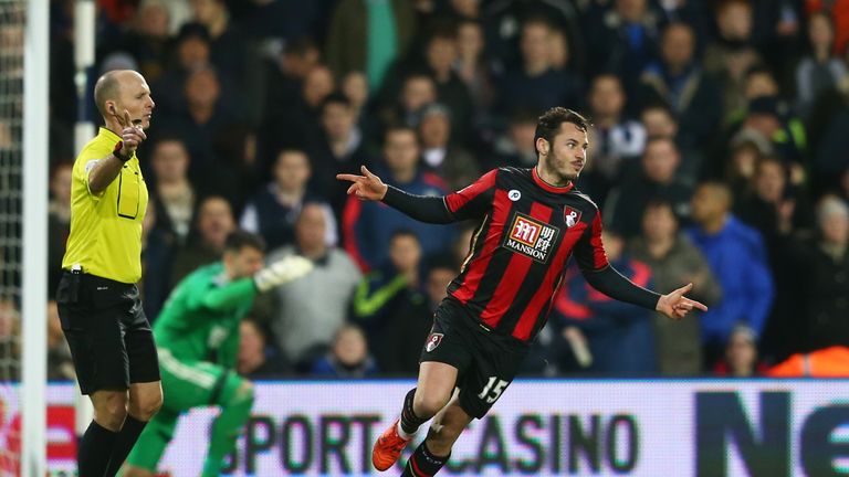 Adam Smith of Bournemouth celebrates scoring his team's first goal against West Brom