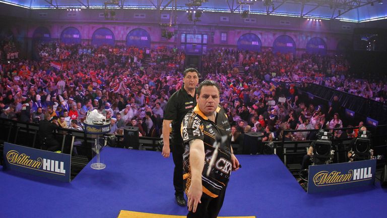WILLIAM HILL WORLD DARTS CHAMPIONSHIP 2016.ALEXANDRA PALACE,LONDON.PIC;LAWRENCE LUSTIG .ROUND3.ADRIAN LEWIS V MENSUR SULJOVIC.ADRIAN LEWIS IN ACTION