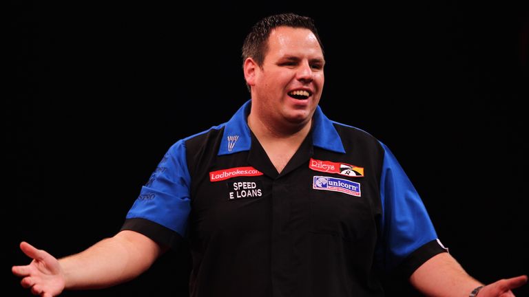 Adrian Lewis of England celebrates a set win against Gary Anderson of Scotland during the Final of the 2011 Ladbrokes.com Wo