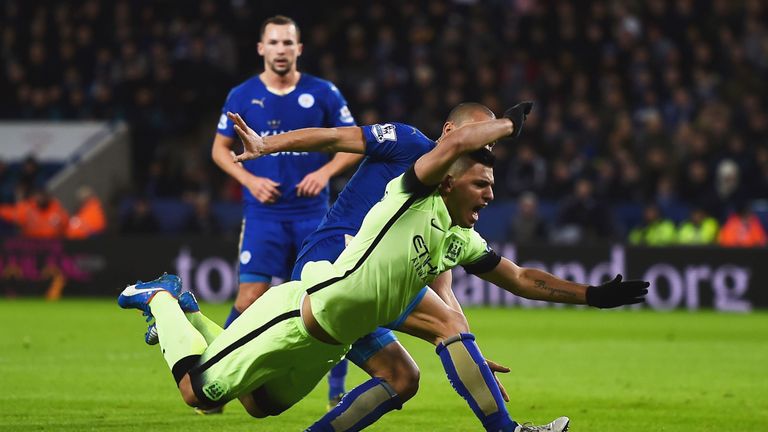 Sergio Aguero went down under pressure from Gokhan Inler