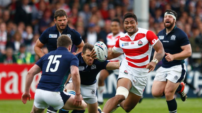 GLOUCESTER, ENGLAND - SEPTEMBER 23:  Amanaki Mafi of Japan breaks during the 2015 Rugby World Cup Pool B match between Scotland and Japan