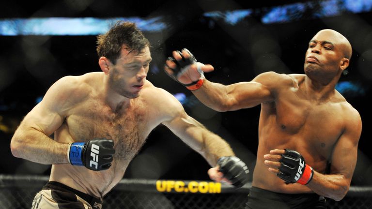 PHILADELPHIA - AUGUST 08:  Anderson Silva (R) throws a right punch to Forrest Griffin during their light heavyweight bout at UFC 101: Declaration at the Wa
