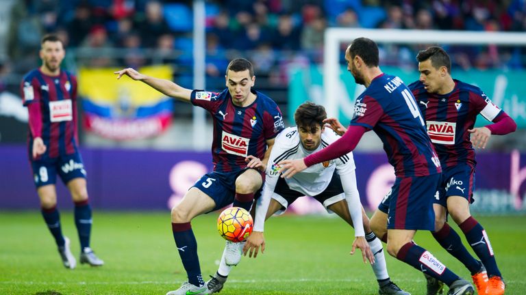 Andres Gomes of Valencia duels for the ball with Gonzalo Escalante of Eibar during the La Liga match