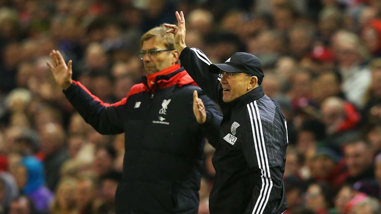 Tony Pulis and Jurgen Klopp on the touchline at Anfield