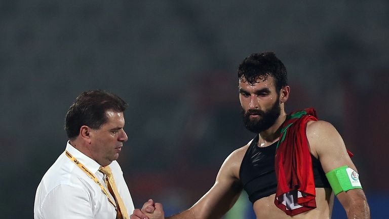 Ange Postecoglou coach of Australia shakes hands with Mile Jedinak 