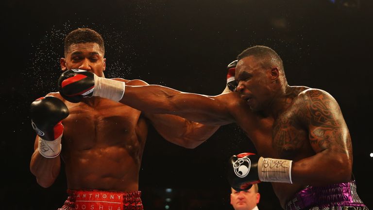 LONDON, ENGLAND - DECEMBER 12:  Anthony Joshua (L) and Dillian Whyte in action during the British and Commonwealth heavyweight title contest at The O2 Aren