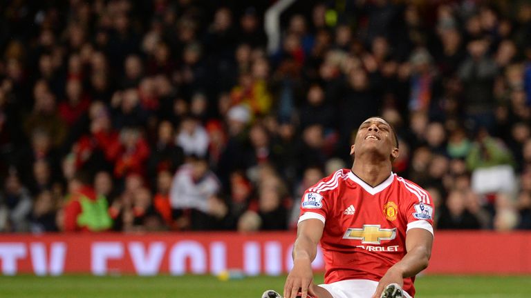 Anthony Martial reacts after missing a chance during the English Premier League football match between Manchester United and West Ham United