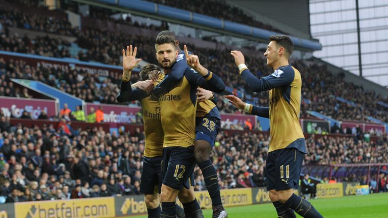 Olivier Giroud celebrates scoring the opening goal for Arsenal against Aston Villa