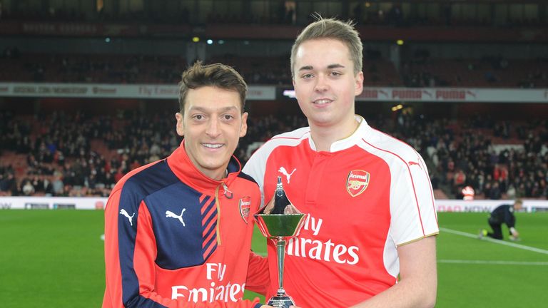 Mesut Ozil recieves the PFA Player Of The Month award