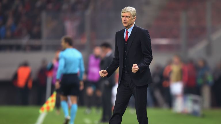 Manager Arsene Wenger of Arsenal against Olympiakos