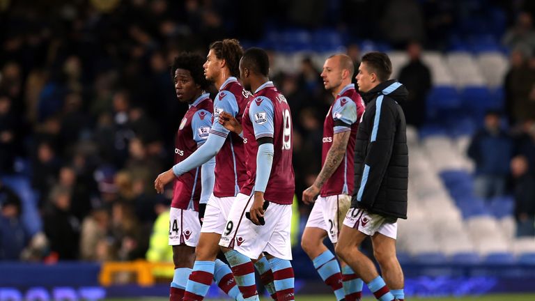 Aston Villa players leave the pitch after the Barclays Premier League match between Everton and Aston Villa at Goodison Park