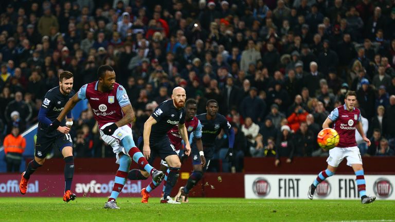 Aston Villa's Jordan Ayew scores his side's first goal from the penatly spot against West Ham