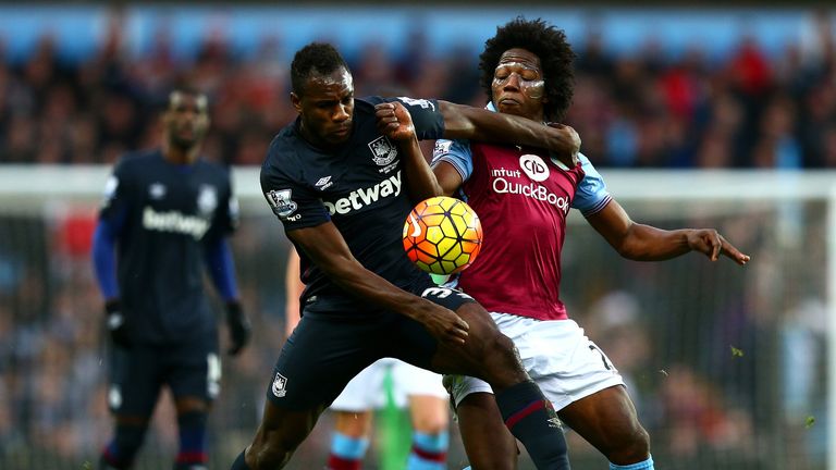 Michail Antonio battles for the ball with Carlos Sanchez