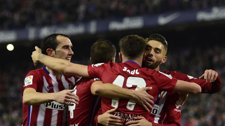 Atletico Madrid players celebrate after Saul Niguez scored a goal during the La Liga match v Athletic Bilbao at the Vicente Calderon