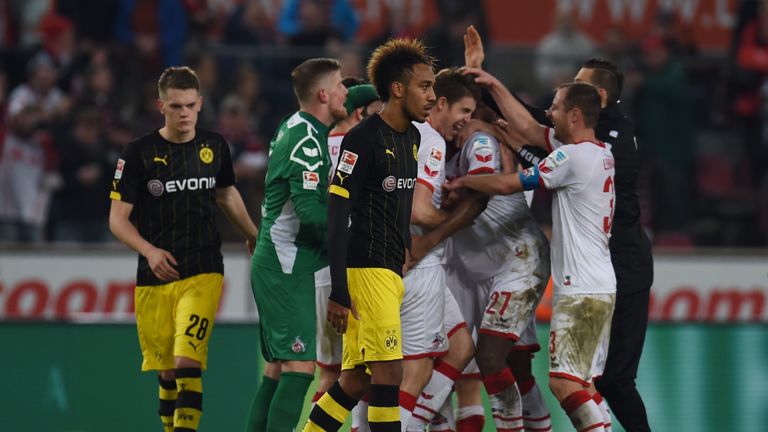 Borussia Dortmund's players look dejected after they lost to Cologne.nn 