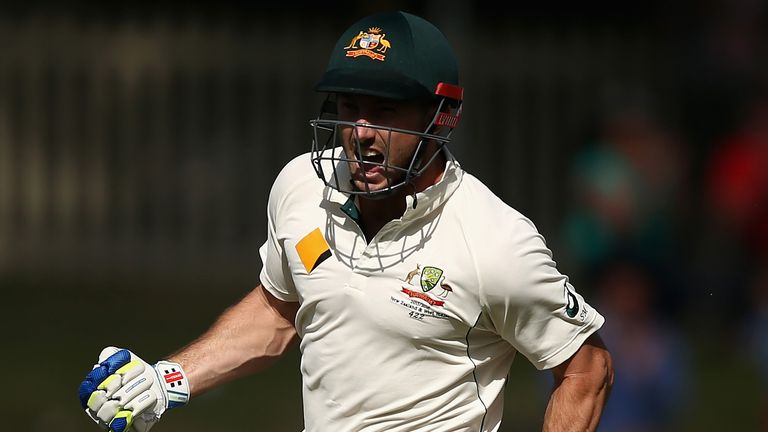 Shaun Marsh of Australia celebrates after reaching his century 