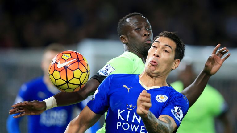 Bacary Sagna and Leonardo Ulloa battle for the ball