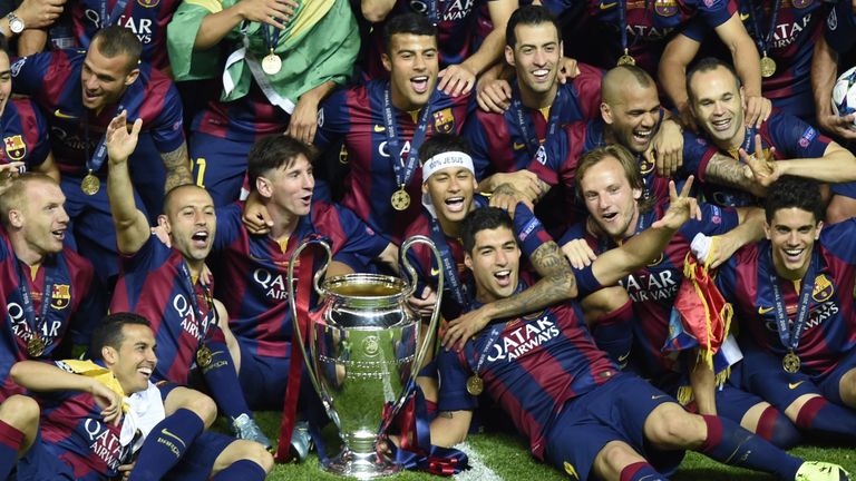 Barcelona celebrate with the Champions League trophy after beating Juventus last year