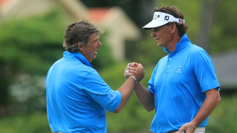 Barry Lane is congratulated by Anders Forsbrand after chipping in for eagle at the last