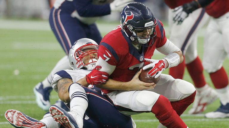 Brian Hoyer #7 of the Houston Texans fumbles the ball while being sacked