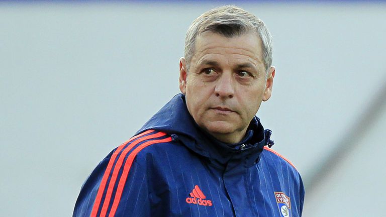 Lyon's assistant coach Bruno Genesio walks prior to the French L1 football match between Gazelec Ajaccio (GFCA) and Lyon (OL) 