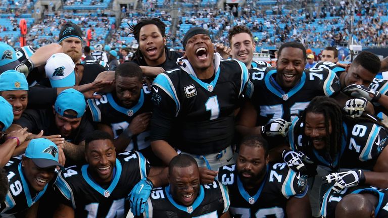 CHARLOTTE, NC - DECEMBER 13:  Cam Newton #1 of the Carolina Panthers celebrates with teammates after defeating the Atlanta Falcons 38-0 at Bank of America 