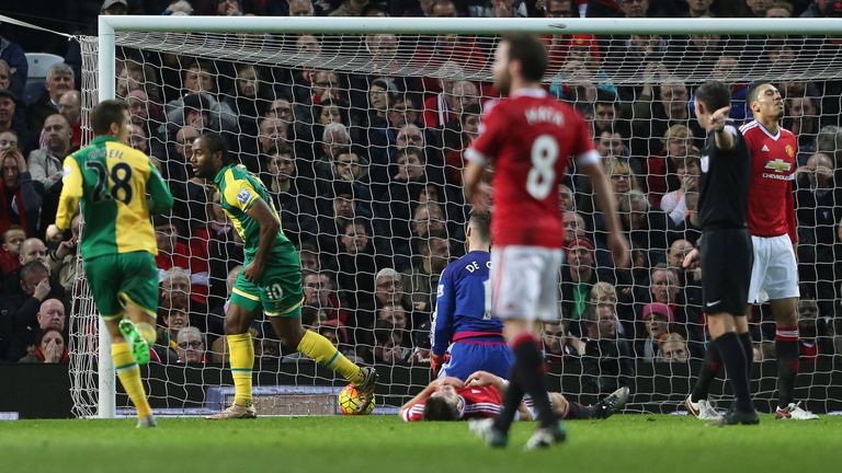 Cameron Jerome of Norwich City celebrates scoring their first goal against Manchester United