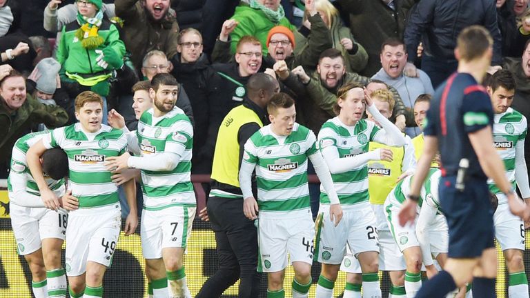 Celtic players celebrate the goal from Tom Rogic at Tynecastle