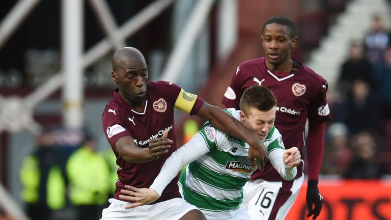 Hearts' Morgaro Gomis (left) challenges Callum McGregor of Celtic, Scottish Premiership, Tynecastle
