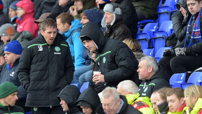 Celtic's Anthony Stokes takes his seat in the stands at Inverness