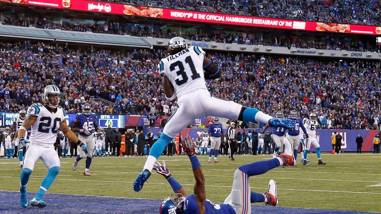 Charles Tillman intercepts for the Panthers in a thrilling win over the Giants