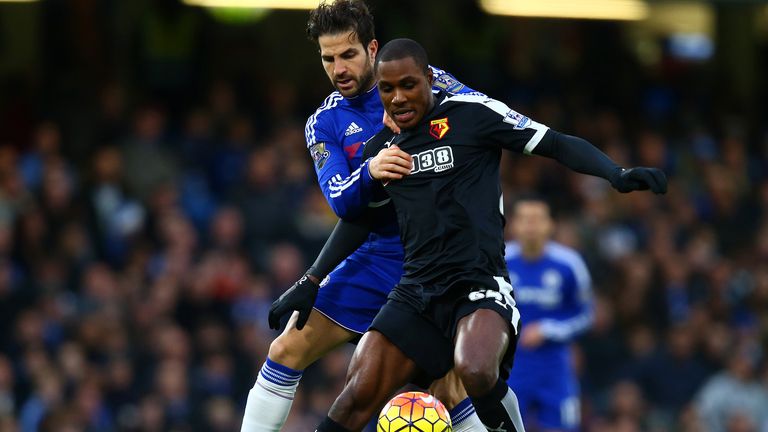 Odion Ighalo holds off Cesc Fabregas