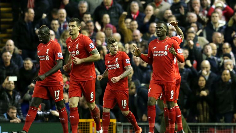 Christian Benteke of Liverpool (right) celebrates after putting Liverpool 1-0 up against Leicester