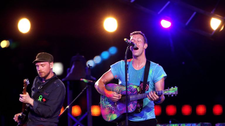Chris Martin (R) and Will Champion of Coldplay perform during the closing ceremony on day 11 of the London 2012 Paralympic