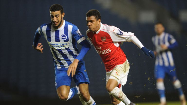 Connor Goldson (L) pictured in action for Brighton's U21 side against Arsenal in November