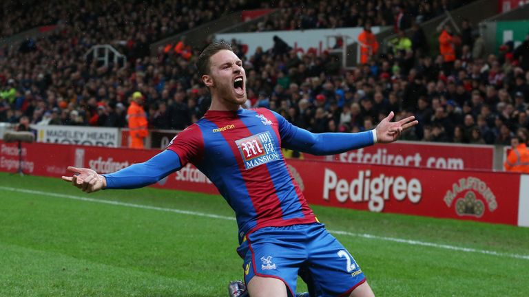 Connor Wickham celebrates opening his Crystal Palace goalscoring account with a penalty at Stoke City