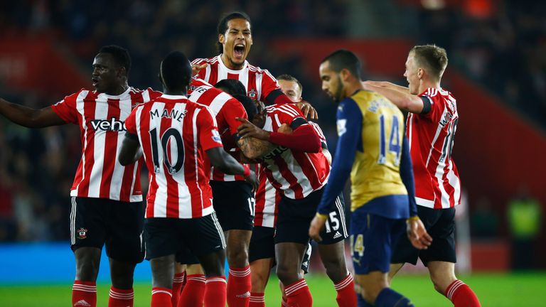 Martina celebrates with team-mates after the opening goal