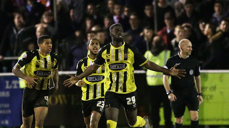 Ayo Obileye celebrates Dagenham's winner