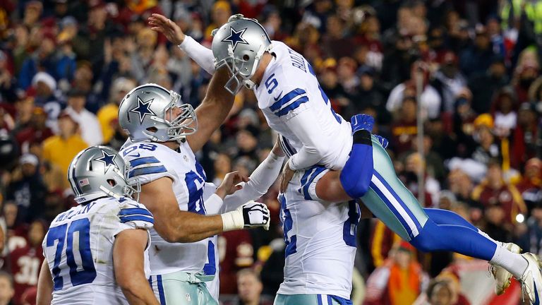 Tight end Jason Witten #82 of the Dallas Cowboys lifts up Dan Bailey #5 after Bailey kicked the game-winning field goal