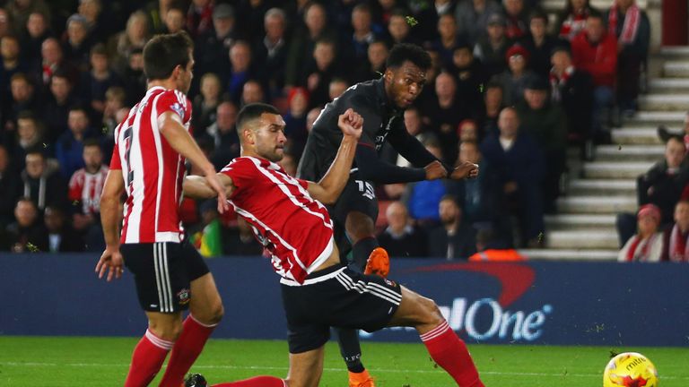 Daniel Sturridge shoots past Steven Caulker to score Liverpool's equaliser