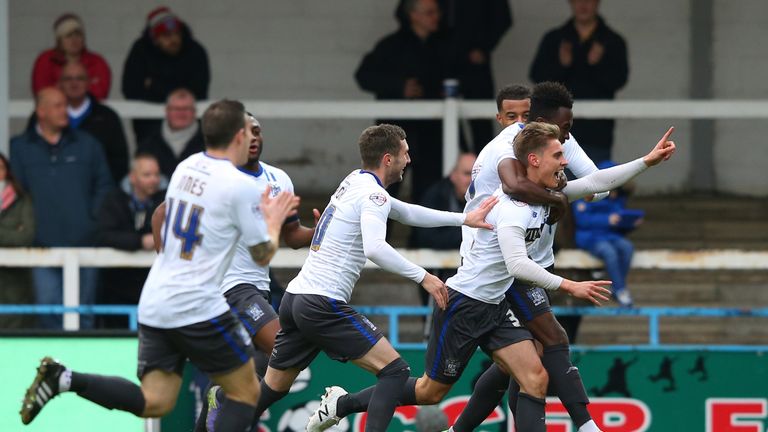 Danny Rose of Bury celebrates after scoring against Rochdale