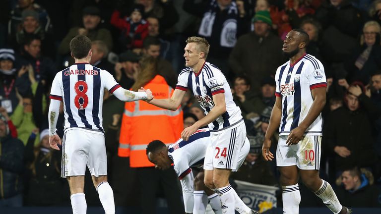 Darren Fletcher (C) of West Bromwich Albion celebrates scoring his team's first goal against Newcastle United