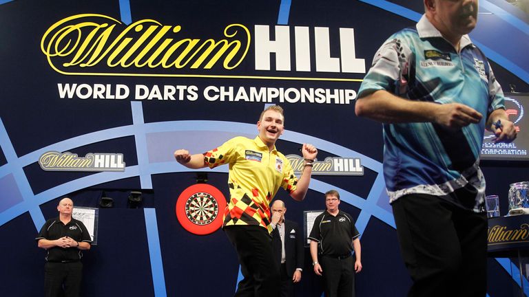 Belgium's Dimitri Van den Bergh against Ian White at the PDC World Darts Championship