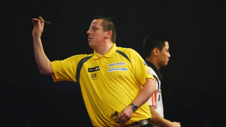 Dave Chisnall in action during his match against Rowby-John Rodrigues during the 2016 William Hill PDC World Darts Champion