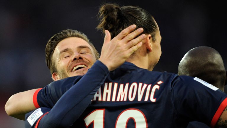 Zlatan Ibrahimovic celebrates a goal with David Beckham after scoring for PSG