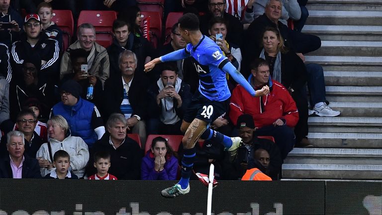 Dele Alli kicks the corner flag as he celebrates scoring Tottenham's second  against Southampton