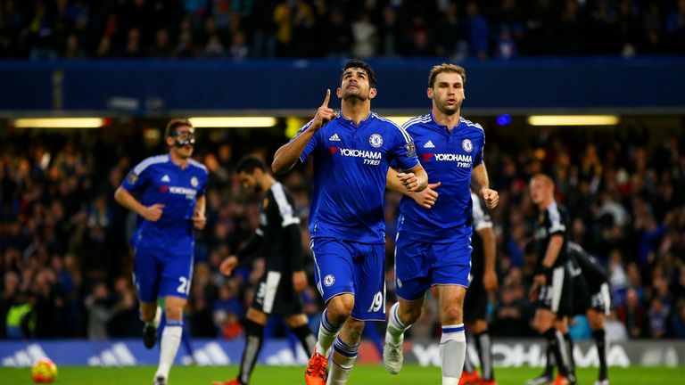 Diego Costa celebrates with team-mates after putting Chelsea 1-0 up