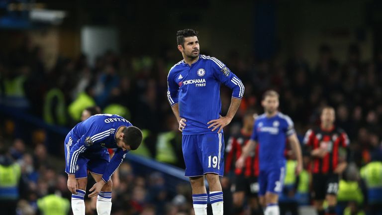 Chelsea's Belgian midfielder Eden Hazard and Chelsea's Brazilian-born Spanish striker Diego Costa (R) wait to restart the game