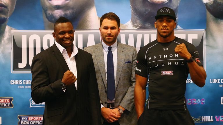 Boxers Dillian Whyte (L) and Anthony Joshua (R) face off during the Head-to-Head Press Conference